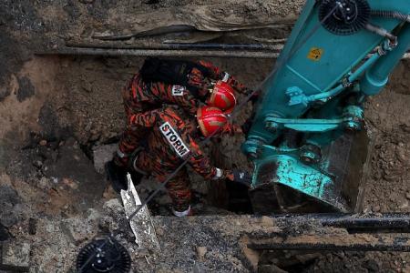 Search for woman who fell into KL sinkhole expands