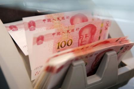 Chinatown shops illegally compare rates for renminbi remittance