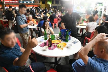 Male patrons unfazed as officers nab 33 women in Geylang raid