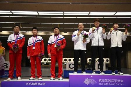 North Korean shooters snub South Koreans on Asian Games podium