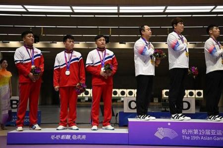 North Korean shooters snub South Koreans on Asian Games podium