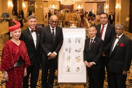 Calligraphy work by President Tharman raises $308k for Red Cross 