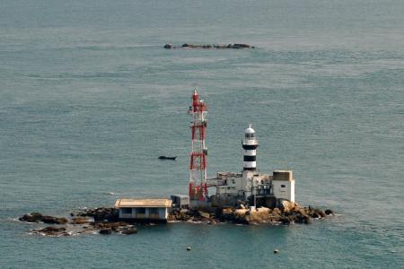 Search and rescue mission under way for capsized barge