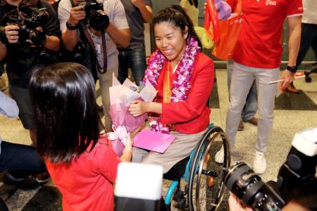 Hero's welcome for Paralympians