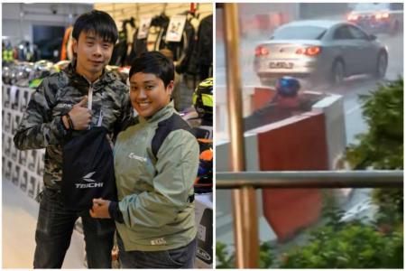 Female biker praised for pushing away barriers in downpour