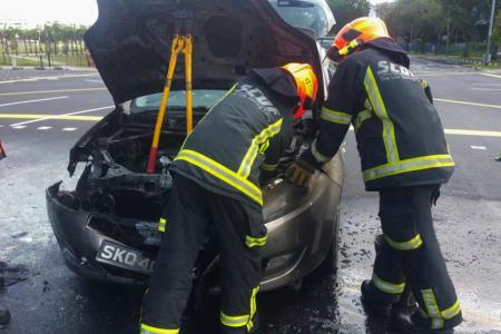 Republic Poly staff gets family from car before engine bursts into flames