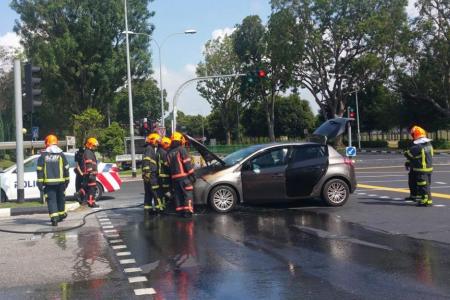 Republic Poly staff gets family from car before engine bursts into flames