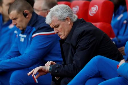 Hughes sacked after Cup exit