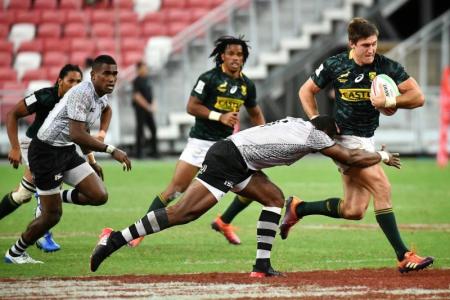 Fiji advance despite two defeats