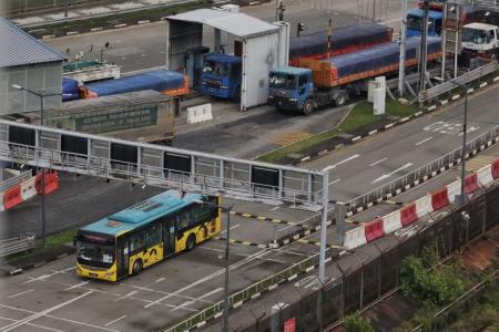 Malaysia truck drivers entering S'pore must show negative Covid test results from March 24