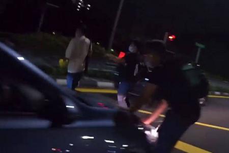 Pedestrians dash across Clementi Road and one gets hit by car, but who's at fault?