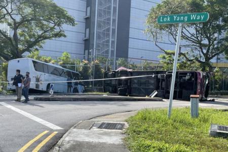 Driver dies, 37 passengers injured after two private buses collide in Jurong West