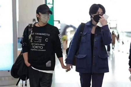 Nicholas Tse and Faye Wong spotted holding hands at China airport