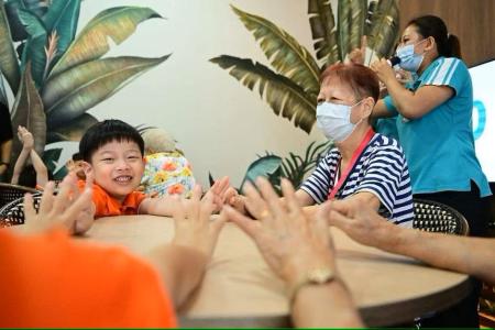 Young and old bond over dialect lessons at senior daycare centre