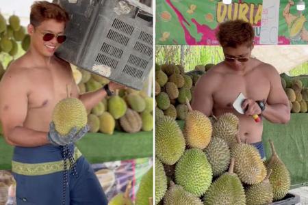 Malaysian durian stall's shirtless sellers stir debate