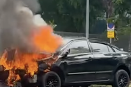 Man taken to hospital after car skids and burns in AMK