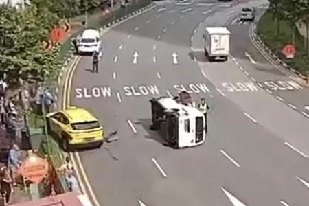 Van flips after collision with taxi in Chinatown