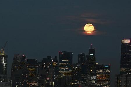 Singaporeans delighted to see supermoon on cloudy night