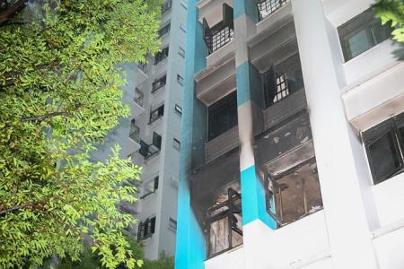 Man who died in Hougang fire identified; family lived in cluttered flat