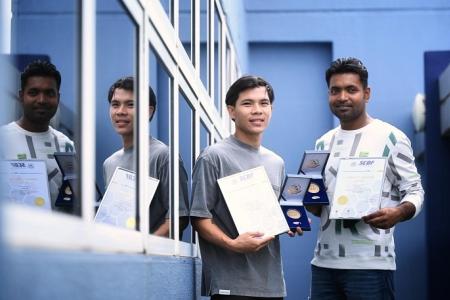 Men awarded for heroic act in saving boy on 3rd-storey ledge