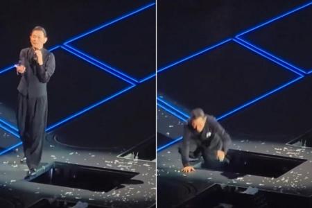 Andy Lau almost falls through trapdoor at Shenzhen concert