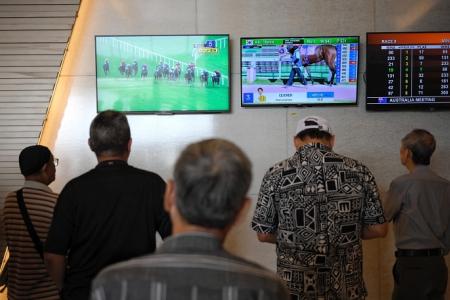 Thousands gather to witness final horse races at Turf Club