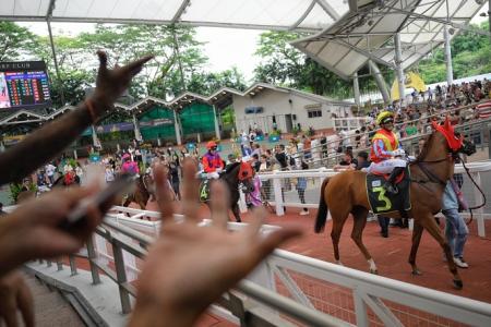 Thousands gather to witness final horse races at Turf Club