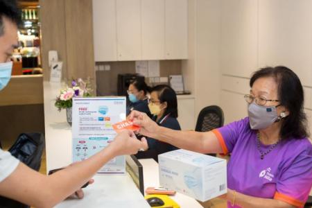 Over 730,000 boxes of masks collected in Temasek distribution drive for lower-income families