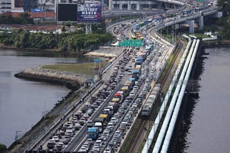 Heavy traffic expected at land checkpoints for school hols