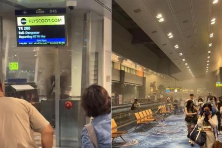 Smoke fills T1 departure area as X-ray machine catches fire