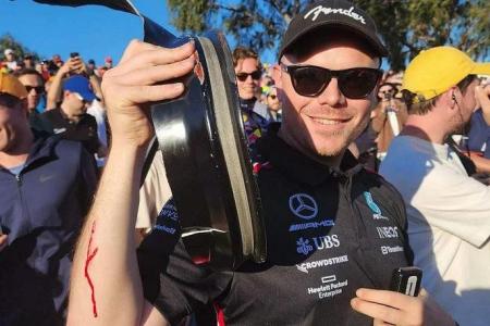 Fan at Australian Grand Prix left bleeding after hit by car debris