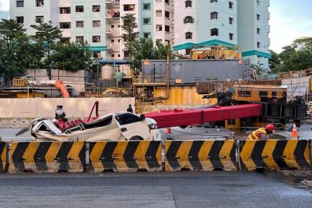 Driver jumps out seconds before van crushed by falling crane in Sengkang, crane operator arrested