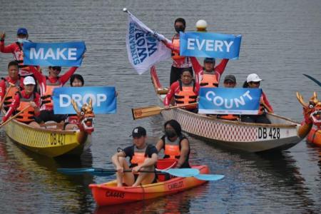 Dragon boaters and S'pore Children's Society beneficiaries team up to clean Lower Seletar Reservoir