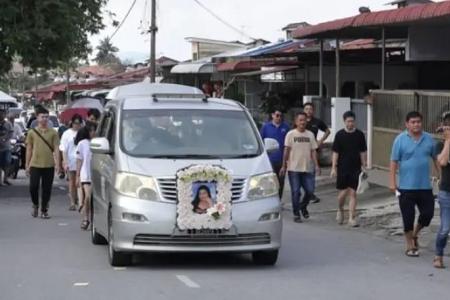 Family, friends pay last respects to Penang woman crushed by container