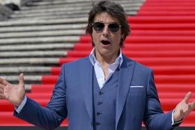 Tom Cruise poses on the red carpet for the screening of Mission: Impossible – Dead Reckoning Part One in Rome on June 19.