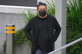 Ng Yu Zhi, the alleged perpetrator of a US$1.1 billion nickel trading scam, arrives at the State Courts on Jan 17, 2023.