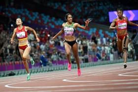 Singapore's Shanti Pereira (centre) competing in the 200m final at the 19th Asian Games in Hangzhou.