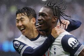 Yves Bissouma celebrates scoring Tottenham's first goal with Son Heung-min..