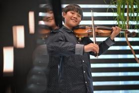 Travis Wong, 9, was named the “absolute” - or overall - winner of the 31st Andrea Postacchini International Violin Competition in Fermo, in central Italy, 