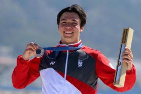 Singaporean kitefoiler Maximilian Maeder with his Paris 2024 bronze medal. It is the country&#039;s first medal since Joseph Schooling won gold at Rio 2016.