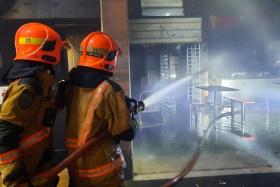 About 100 people were evacuated after a fire broke out at a coffee shop at Block 717 Yishun Street 71 on Sept 18.