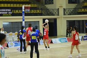 Singapore goal-attack Amandeep Kaur Chahal attempting a shot in the Republic's semi-final win over Malaysia at the Asian Netball Championship on Oct 26, 2024.