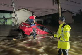 Kota Tinggi police said a man was rescued after his car was swept away by the water current in Jalan Liku Cina, near Taman Aman, on Jan 10.