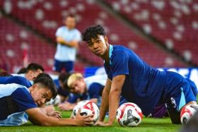 Amirul Adli (left) and Jordan Emaviwe in training at the National Stadium ahead of Singapore&#039;s clash with Thailand on Dec 17.