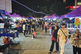 Quieter crowds seen at the popular Pasar Karat night market near Johor Bahru city centre on Oct 4.