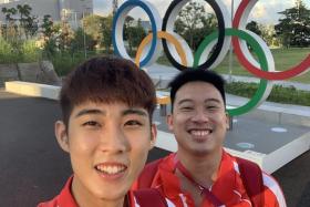 Singapore badminton national singles coach Kelvin Ho (right) and men's singles player Loh Kean Yew at the Paris Olympics.