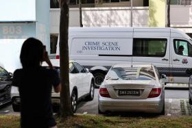 A Criminal Investigation Department van at Block 803 Yishun Ring Road on July 27.