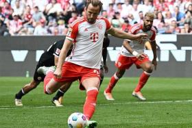 Soccer Football - Bundesliga - Bayern Munich v Eintracht Frankfurt - Allianz Arena, Munich, Germany - April 27, 2024 Bayern Munich&#039;s Harry Kane scores their second goal from the penalty spot REUTERS/Angelika Warmuth