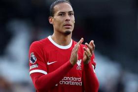 FILE PHOTO: Soccer Football - Premier League - Fulham v Liverpool - Craven Cottage, London, Britain - April 21, 2024 Liverpool&#039;s Virgil van Dijk applauds fans after the match Action Images via Reuters/Andrew Boyers