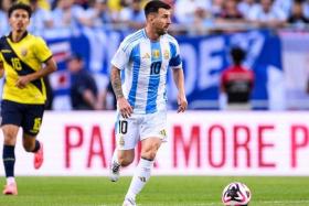 FILE PHOTO: Jun 9, 2024; Chicago, Illinois, USA; Argentina forward Lionel Messi (10) dribbles the ball against Ecuador during the second half at Soldier Field. Mandatory Credit: Daniel Bartel-USA TODAY Sports/File Photo